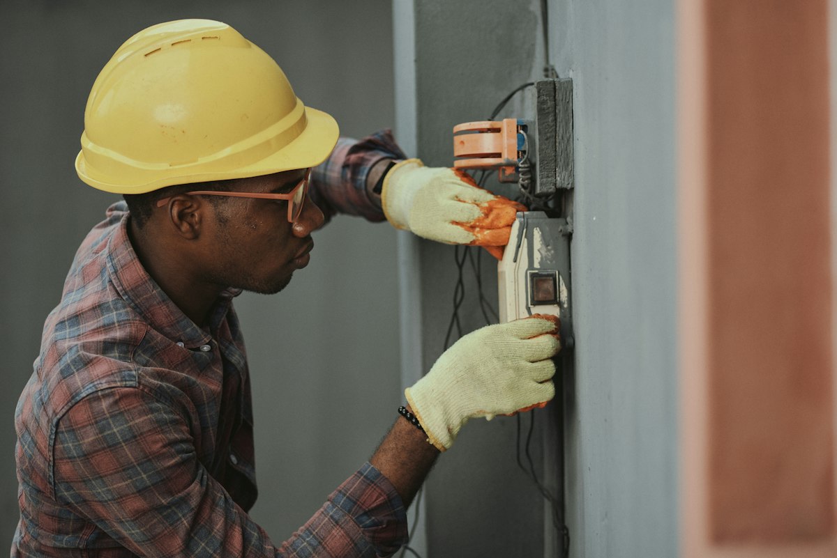 Technician working on facility equipment